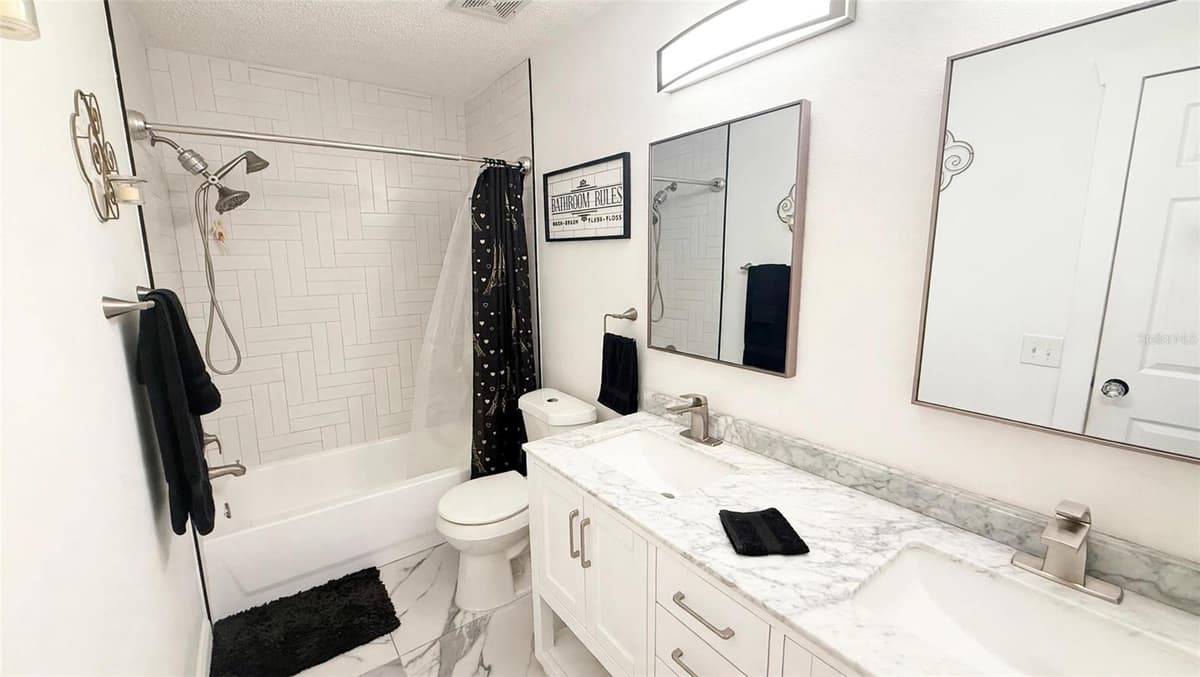 7102 HOLLOWELL DRIVE — photo 8 of 20