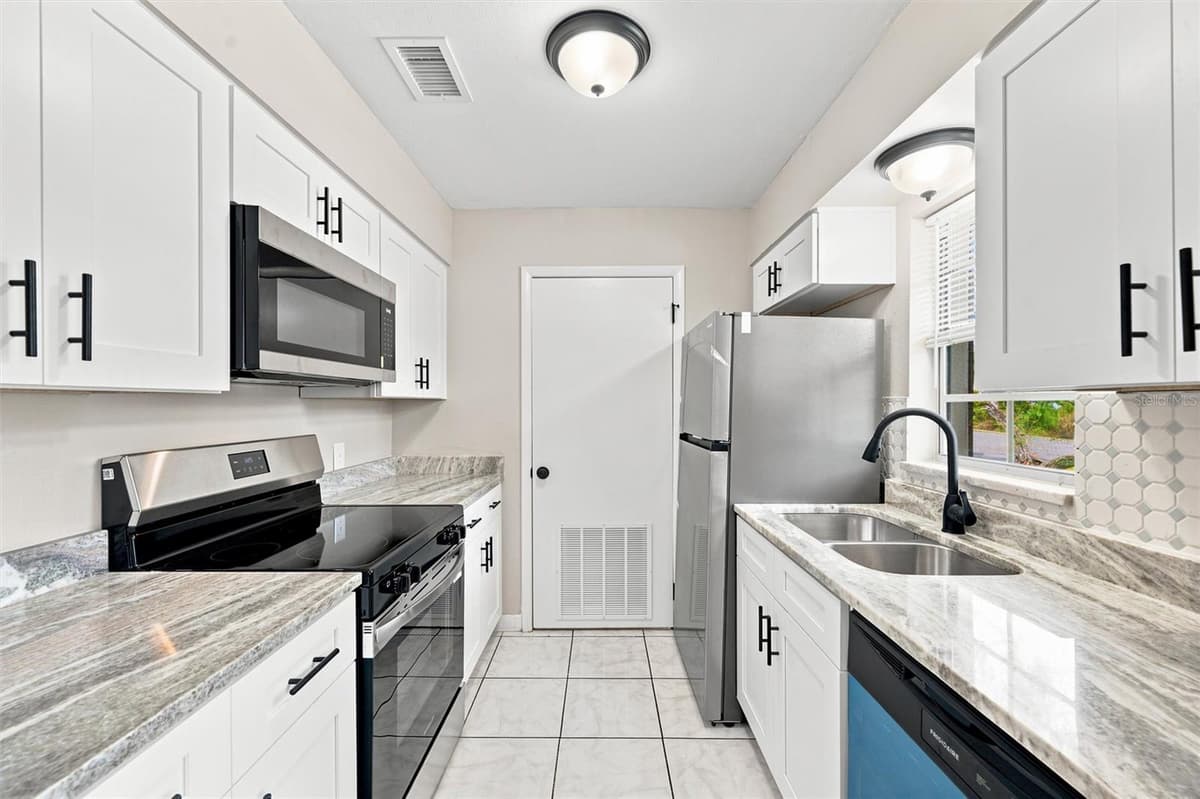 4215 BAY DRIVE — photo 3 of 24
