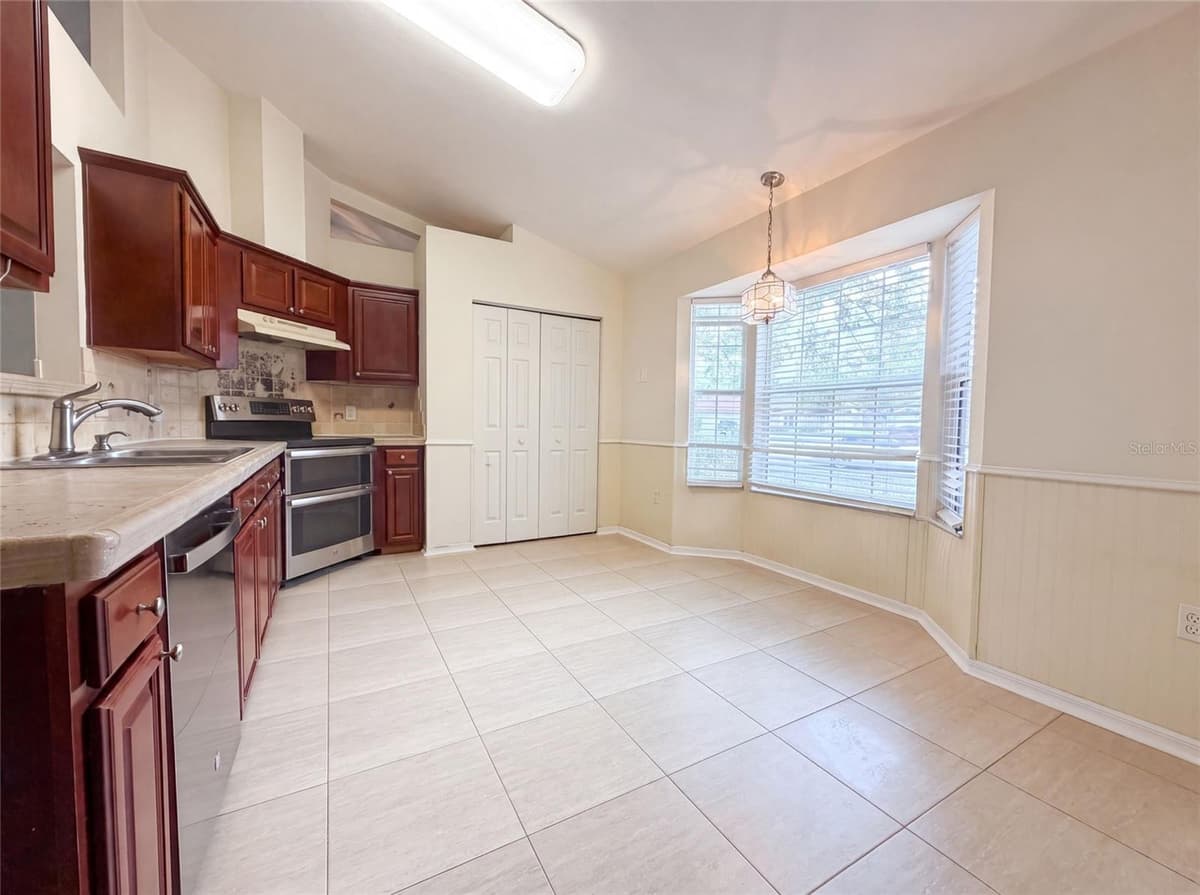 944 87TH DRIVE — photo 10 of 23