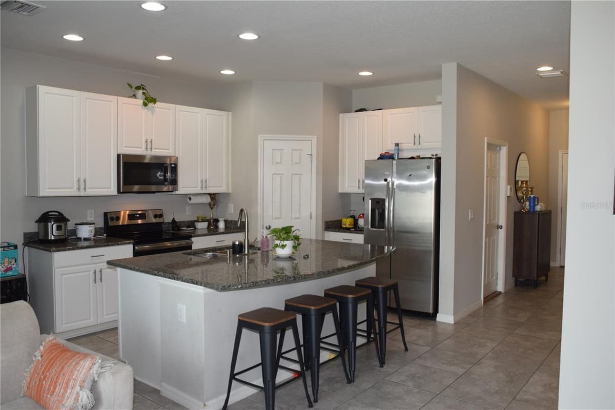 7043 SUMMER HOLLY PLACE — photo 5 of 23