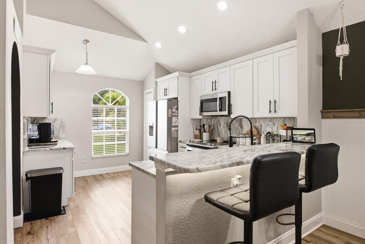 4730 WOLFRAM LANE — photo 8 of 54