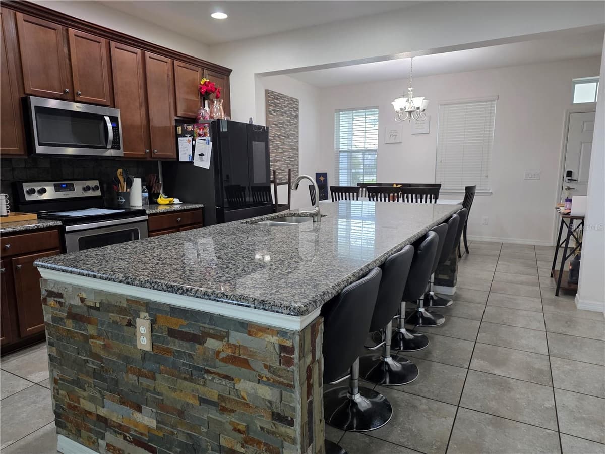 12749 GARRIDAN AVENUE — photo 5 of 36