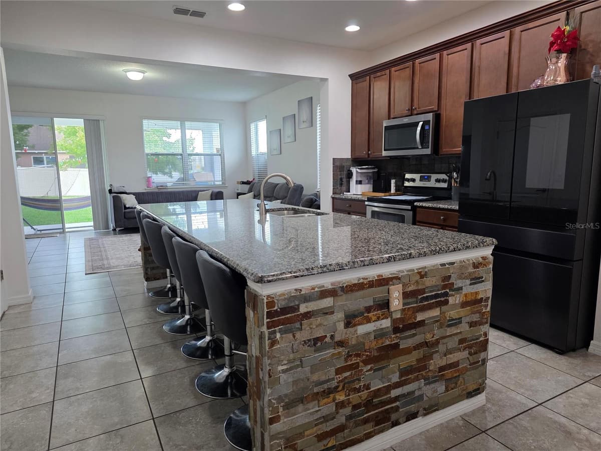12749 GARRIDAN AVENUE — photo 3 of 36