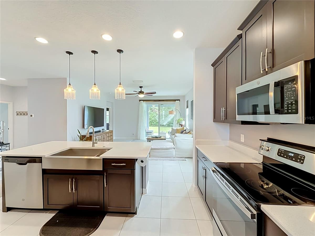 5516 WINDSONG OAK DRIVE — photo 8 of 57