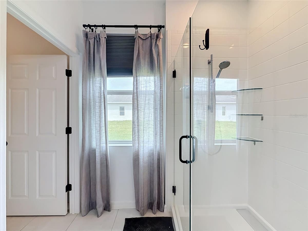 5516 WINDSONG OAK DRIVE — photo 26 of 57