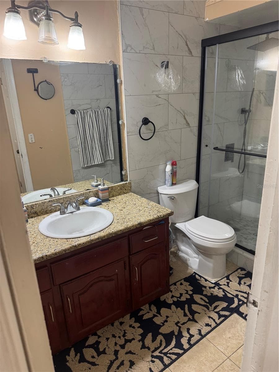 7047 PLUMWOOD COURT — photo 10 of 11