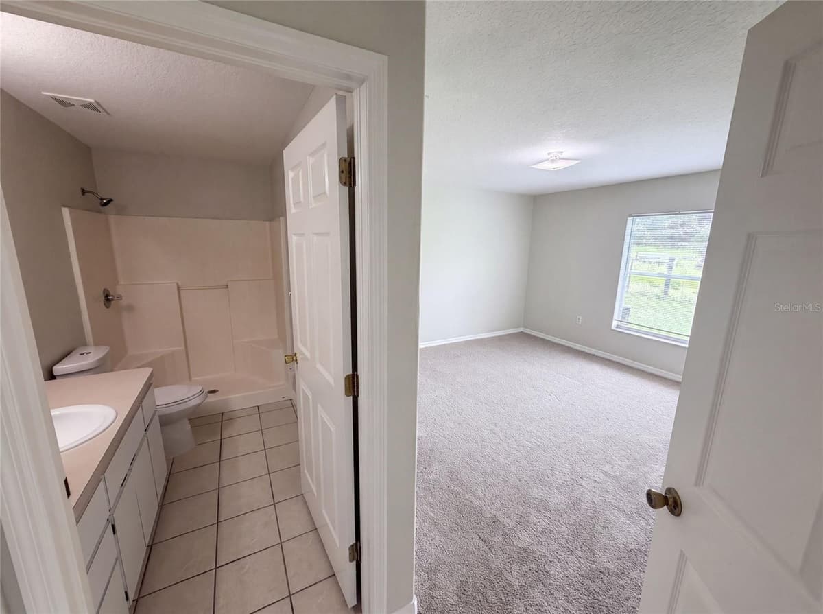 37209 GRASSY HILL LANE — photo 9 of 26