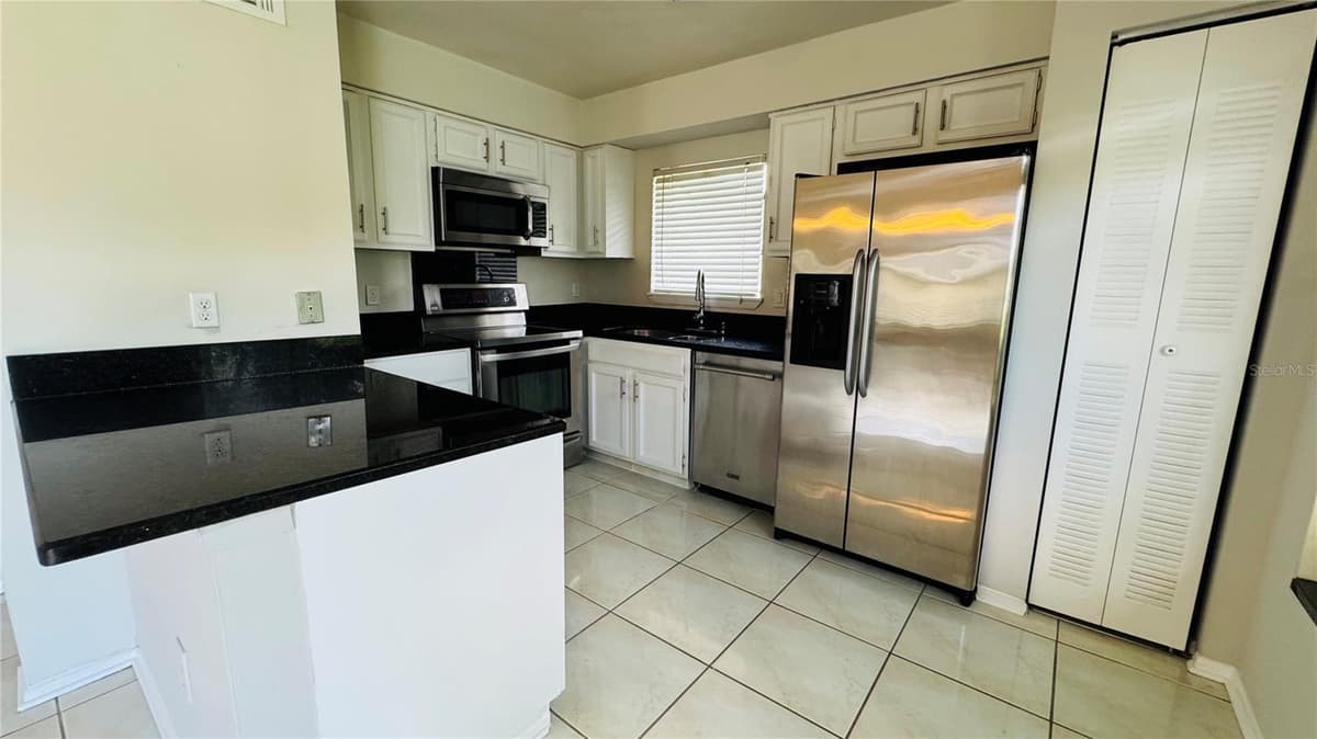 4415 PINEBARK AVENUE — photo 4 of 23