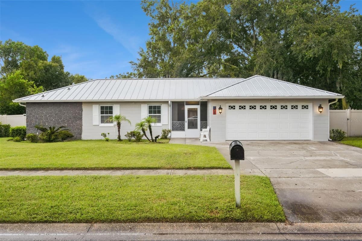 7640 VILLAGE GREEN DR — photo 2 of 28