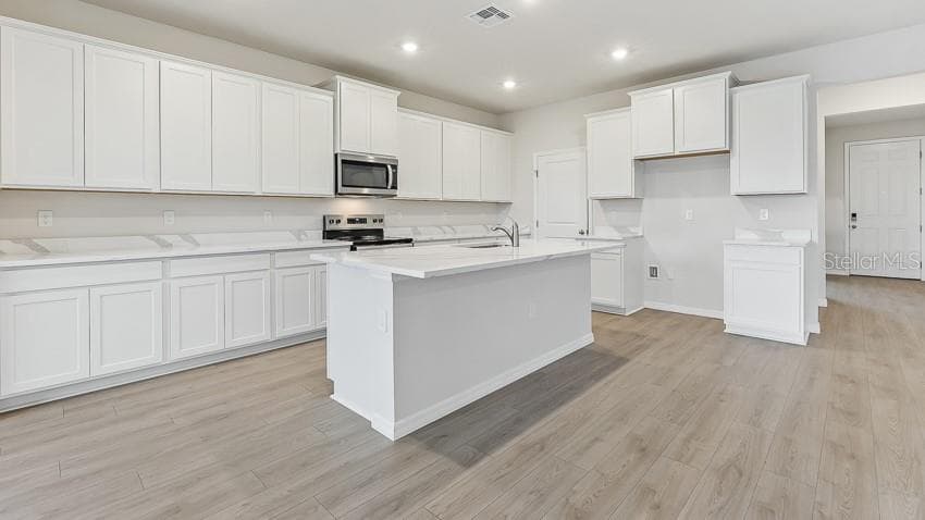 10436 WOODLAND GARDEN WAY — photo 4 of 36