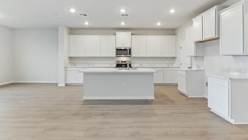 10436 WOODLAND GARDEN WAY — photo 5 of 36