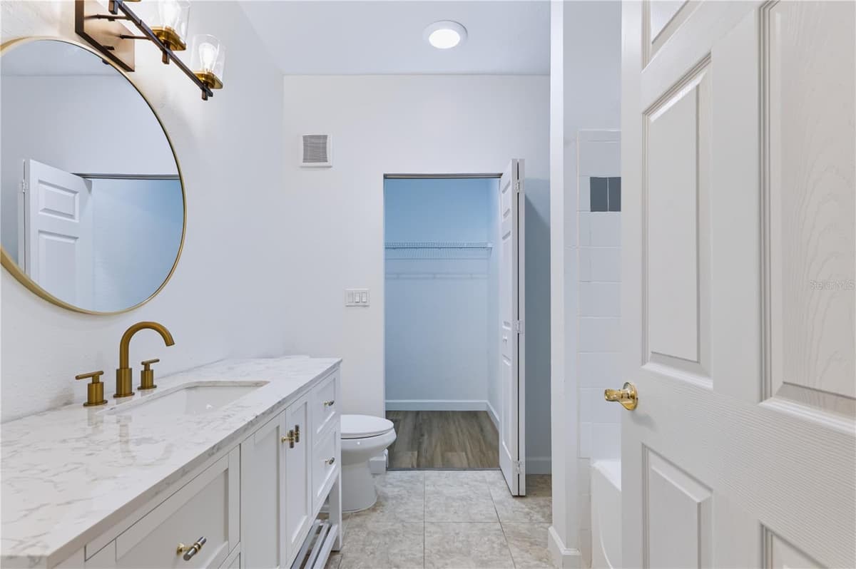 9818 LAKE CHASE ISLAND WAY — photo 9 of 39