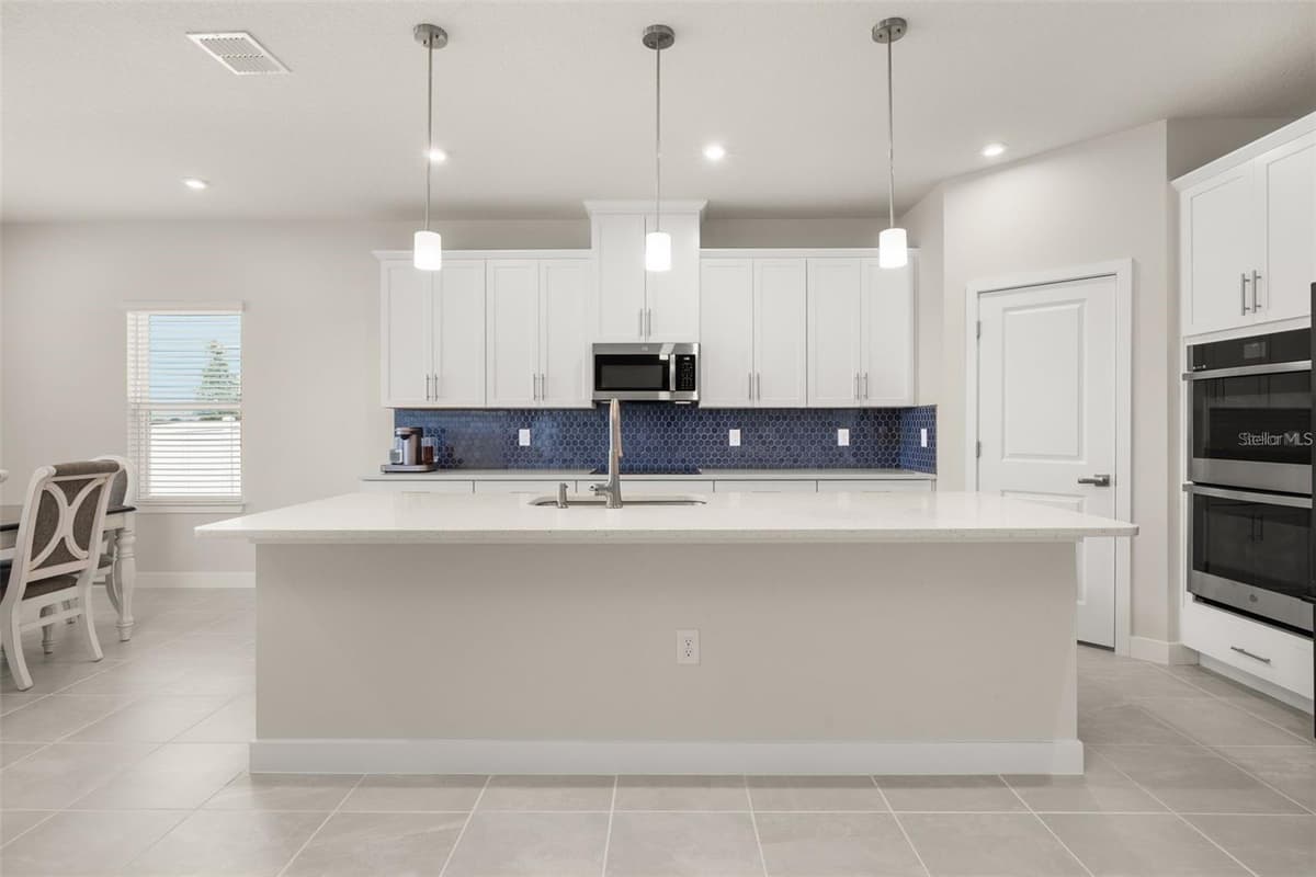 11182 NELLIE CROSSING CIRCLE — photo 5 of 32