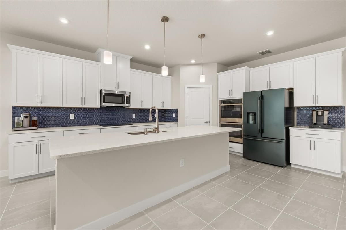 11182 NELLIE CROSSING CIRCLE — photo 4 of 32