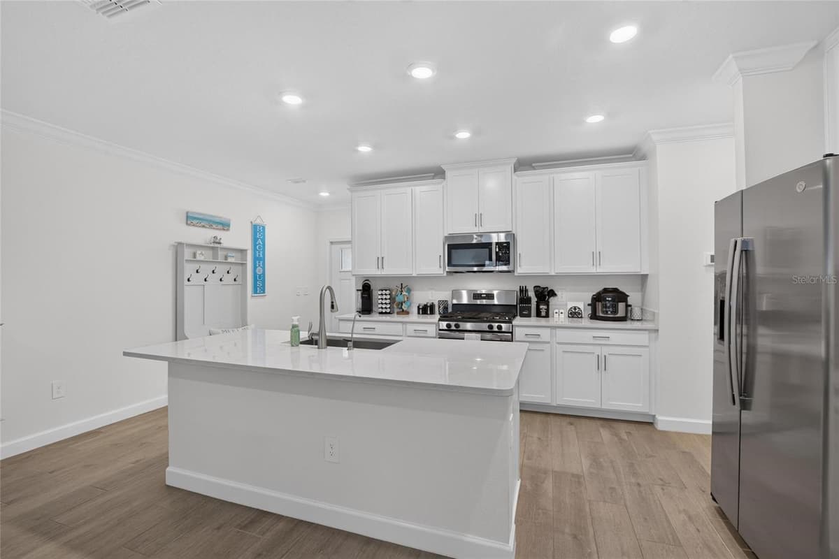 17242 HOLLY WELL AVENUE — photo 9 of 96