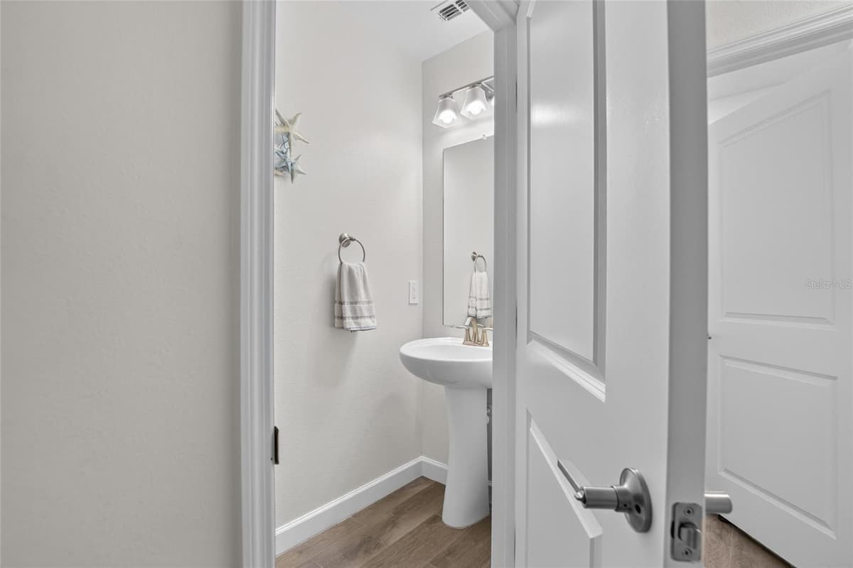 17242 HOLLY WELL AVENUE — photo 11 of 96