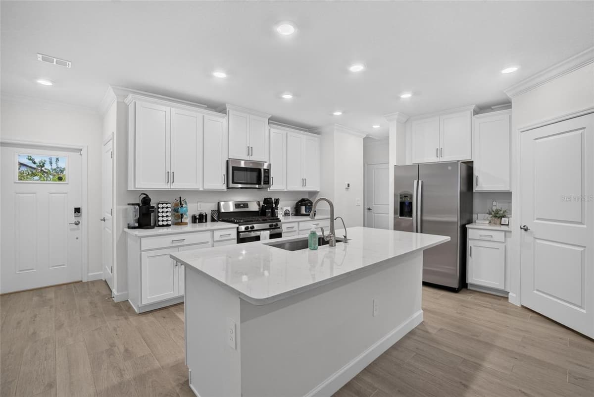 17242 HOLLY WELL AVENUE — photo 8 of 96