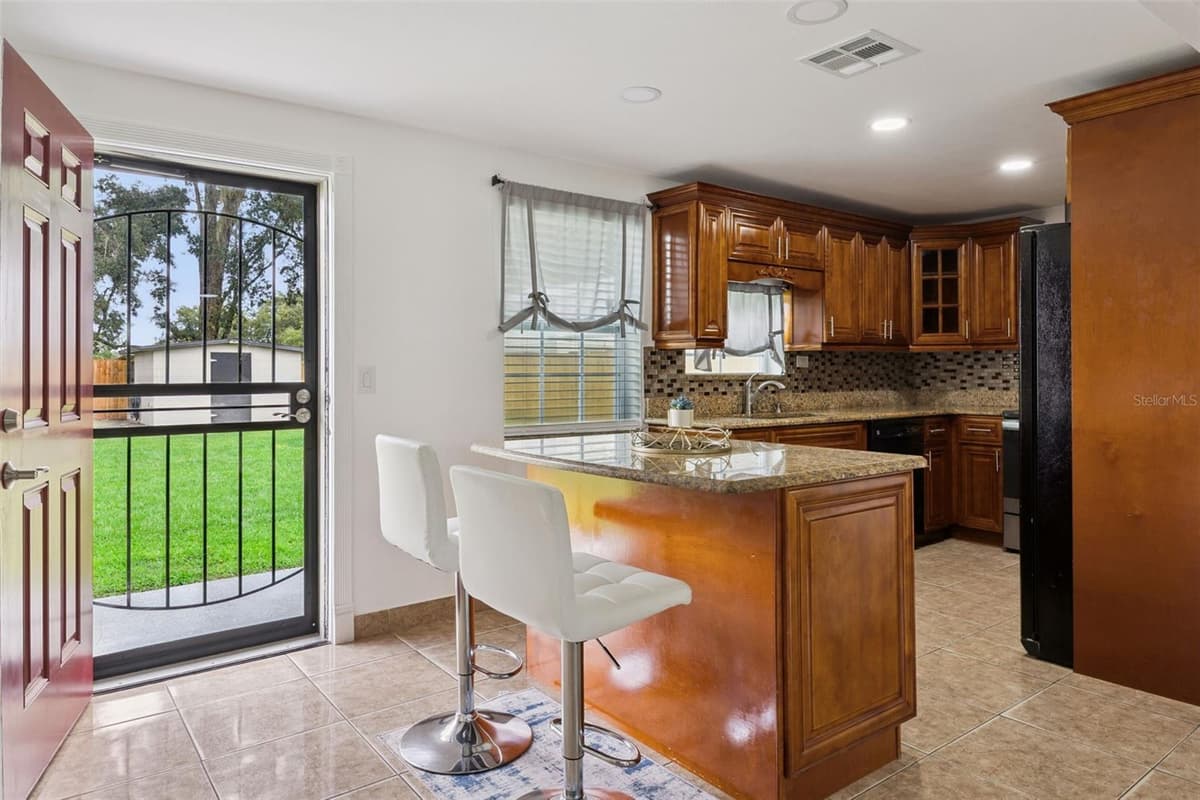 5907 DAHLIA DRIVE — photo 6 of 34