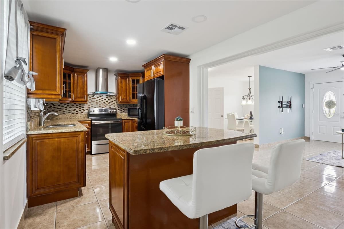 5907 DAHLIA DRIVE — photo 7 of 34