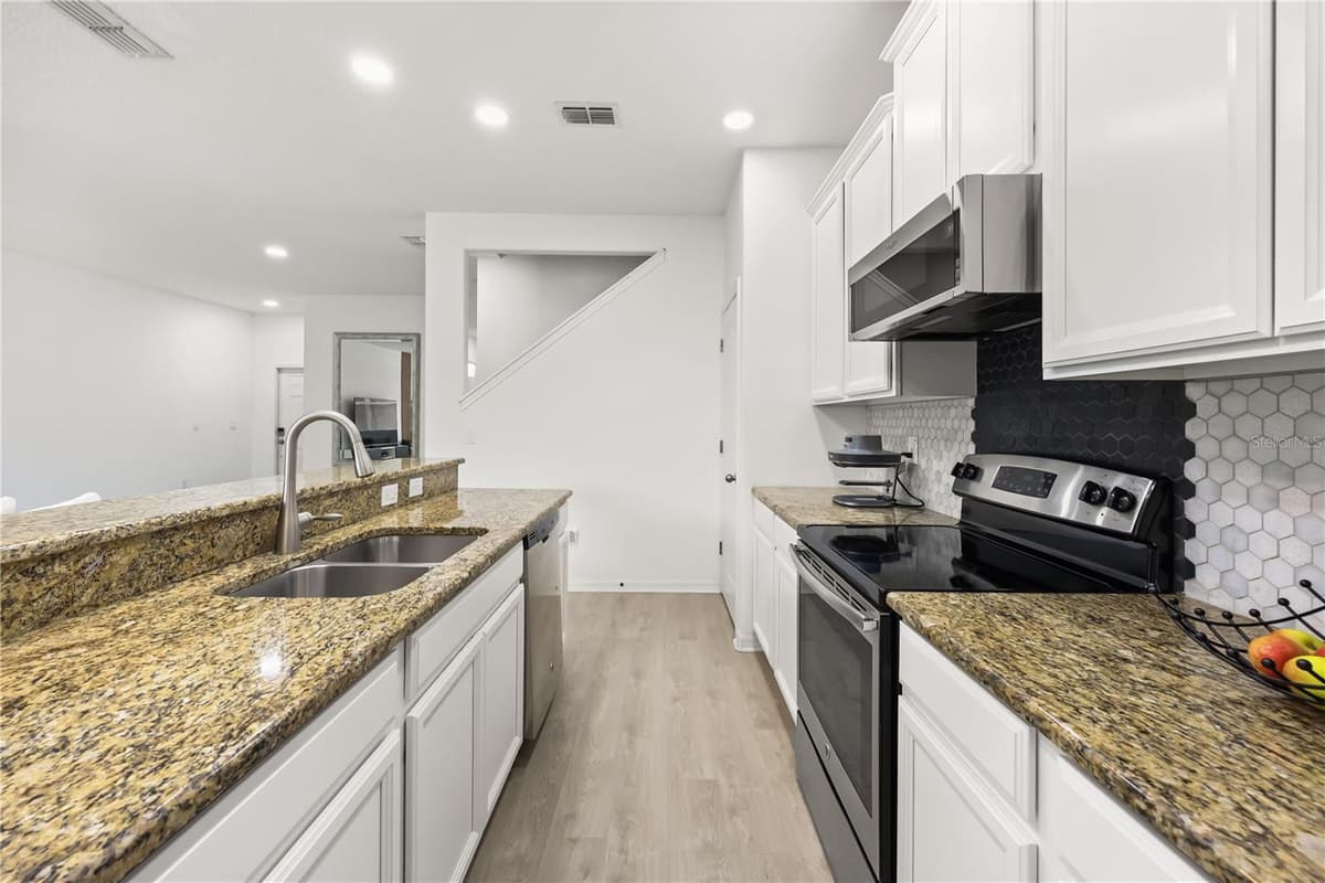 7668 FAIRGROVE AVENUE — photo 14 of 36