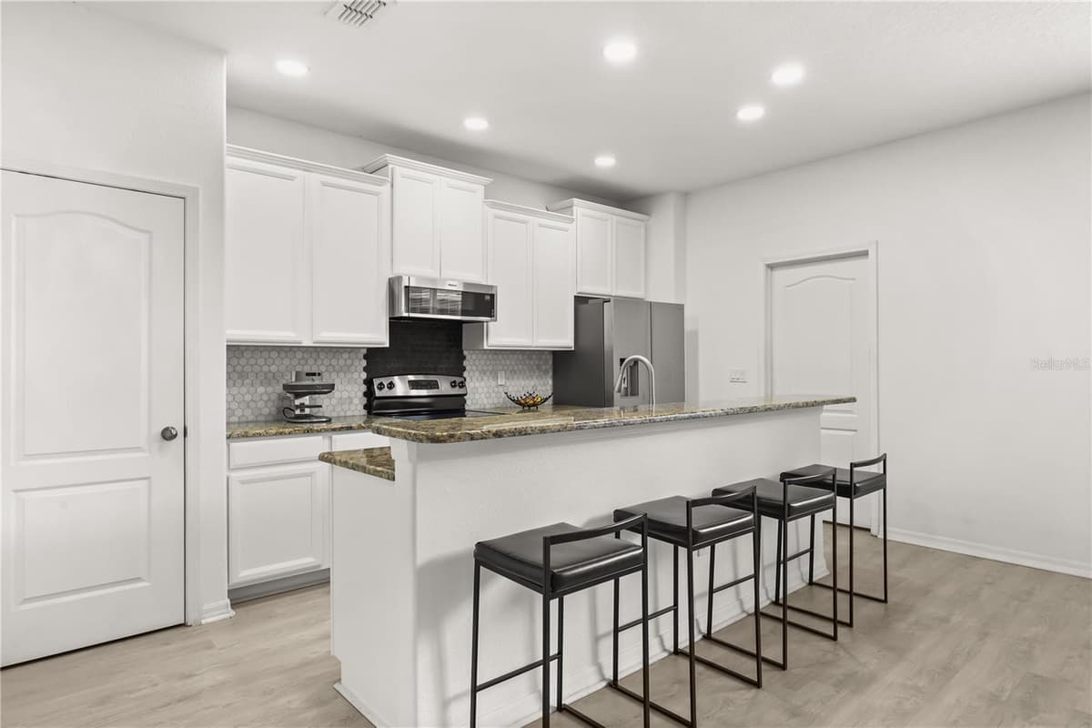 7668 FAIRGROVE AVENUE — photo 12 of 36