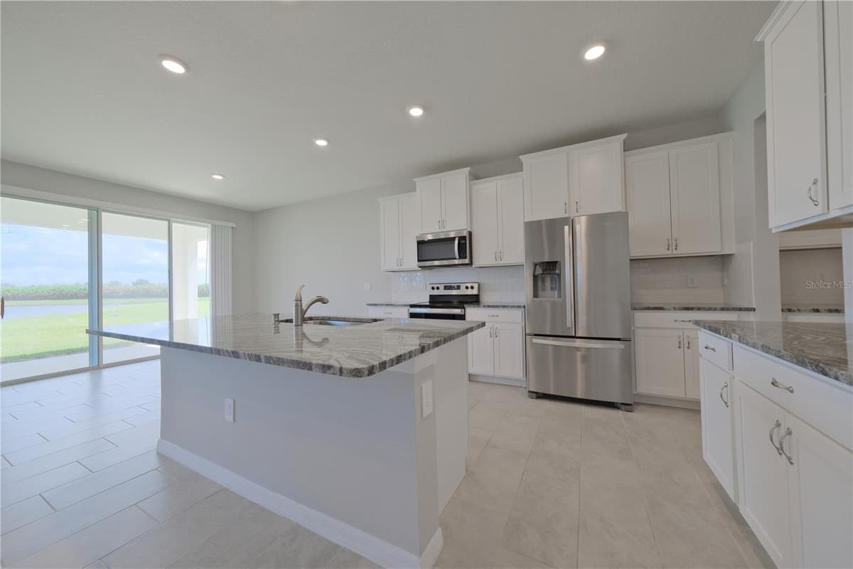 5748 WOODLAND SAGE DRIVE — photo 8 of 55