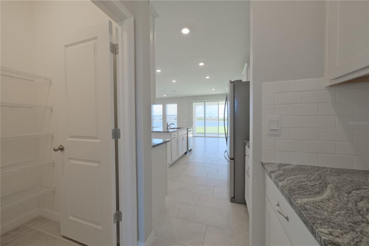 5748 WOODLAND SAGE DRIVE — photo 13 of 55