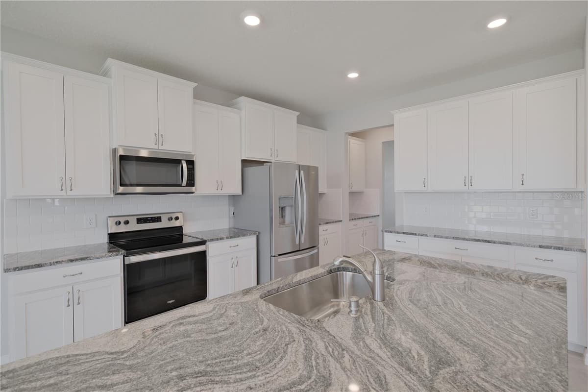5748 WOODLAND SAGE DRIVE — photo 9 of 55