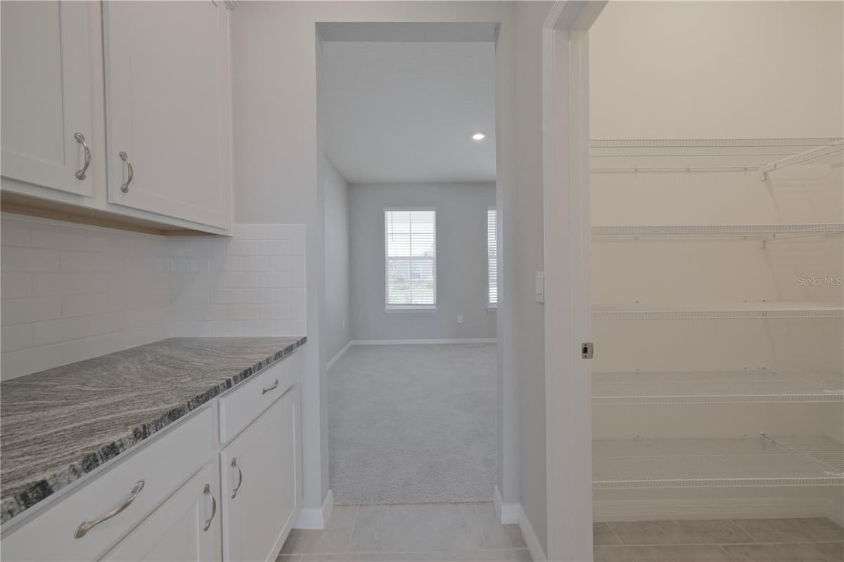 5748 WOODLAND SAGE DRIVE — photo 12 of 55