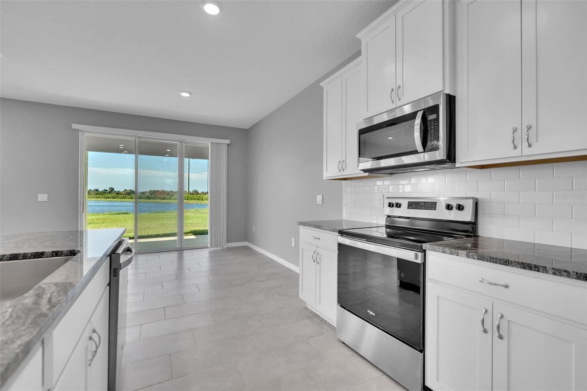 5748 WOODLAND SAGE DRIVE — photo 12 of 76