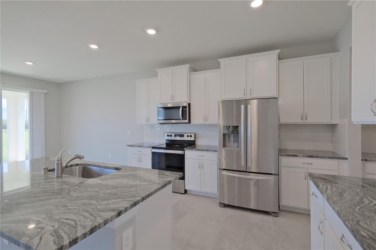 5748 WOODLAND SAGE DRIVE — photo 10 of 55