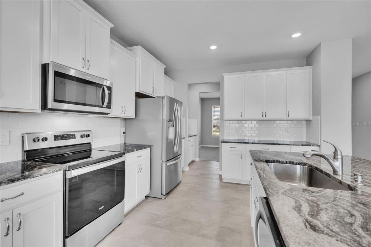 5748 WOODLAND SAGE DRIVE — photo 11 of 76