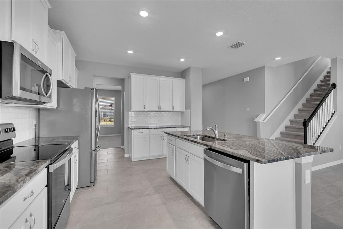 5748 WOODLAND SAGE DRIVE — photo 10 of 76