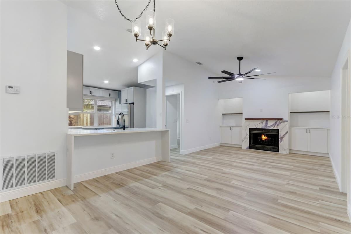 7711 LAKESIDE WOODS DRIVE — photo 7 of 48