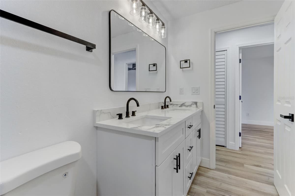 7711 LAKESIDE WOODS DRIVE — photo 32 of 48