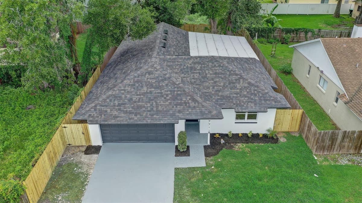 7711 LAKESIDE WOODS DRIVE — photo 2 of 48