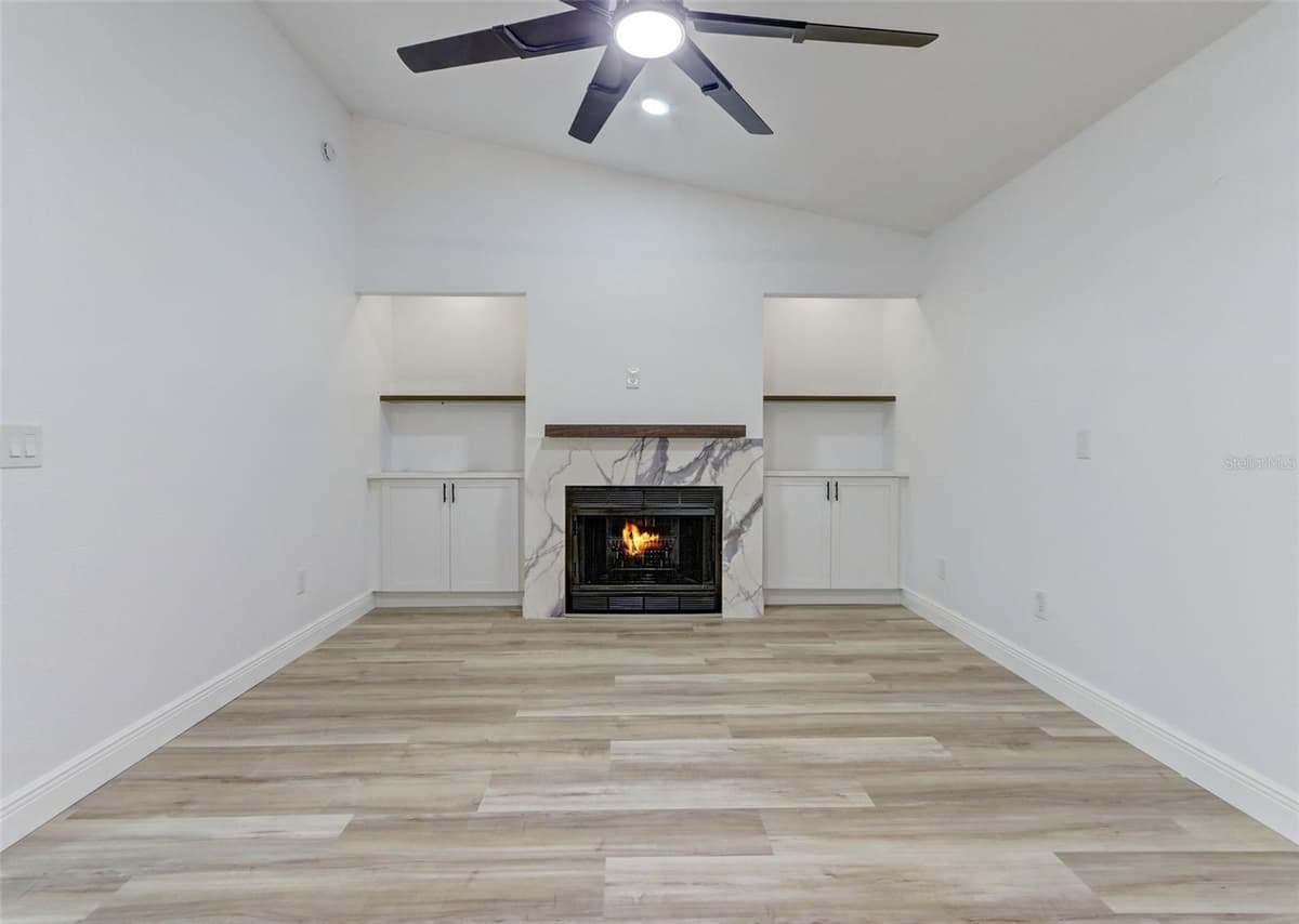 7711 LAKESIDE WOODS DRIVE — photo 9 of 48