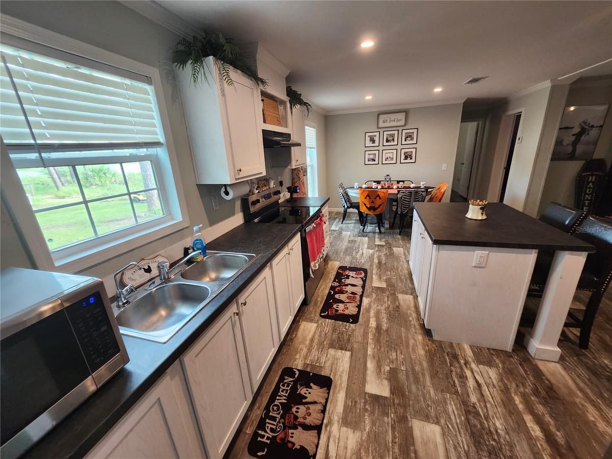 4550 POLK CITY ROAD — photo 9 of 23
