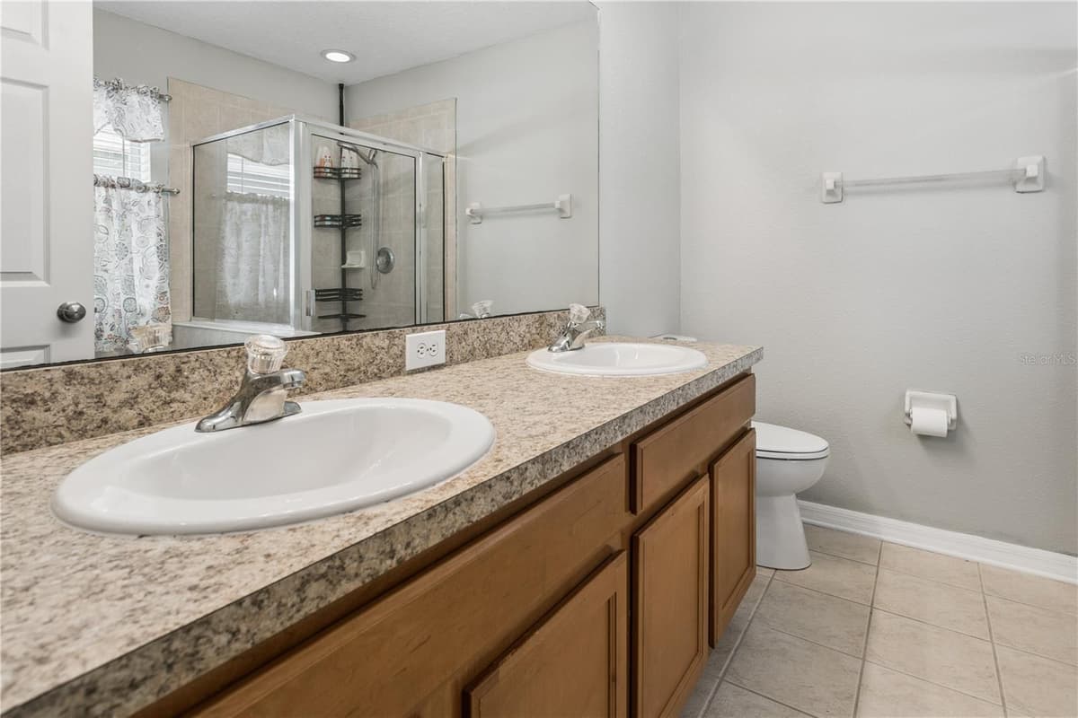 5701 SWEET WILLIAM TERRACE — photo 12 of 34