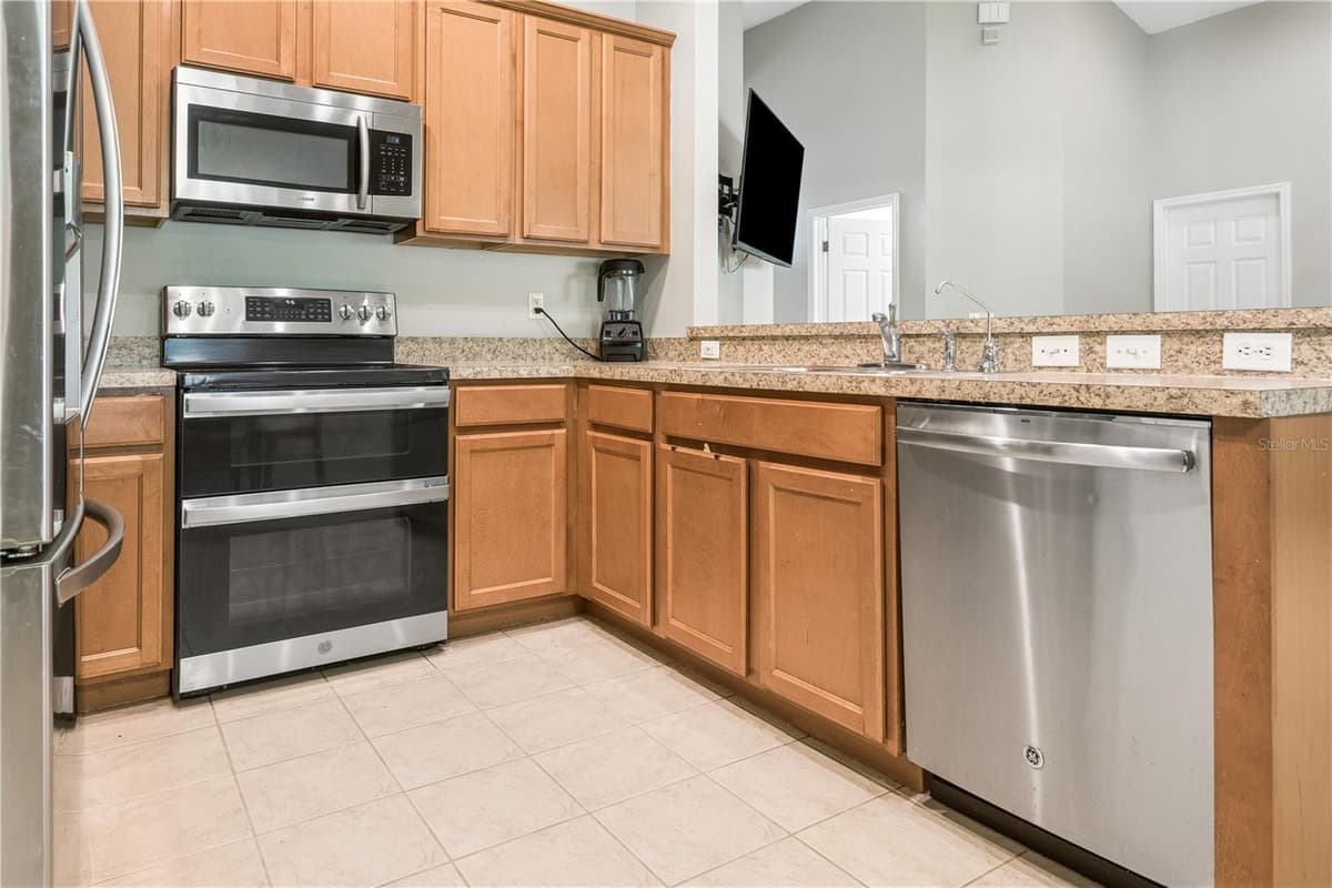 5701 SWEET WILLIAM TERRACE — photo 7 of 34