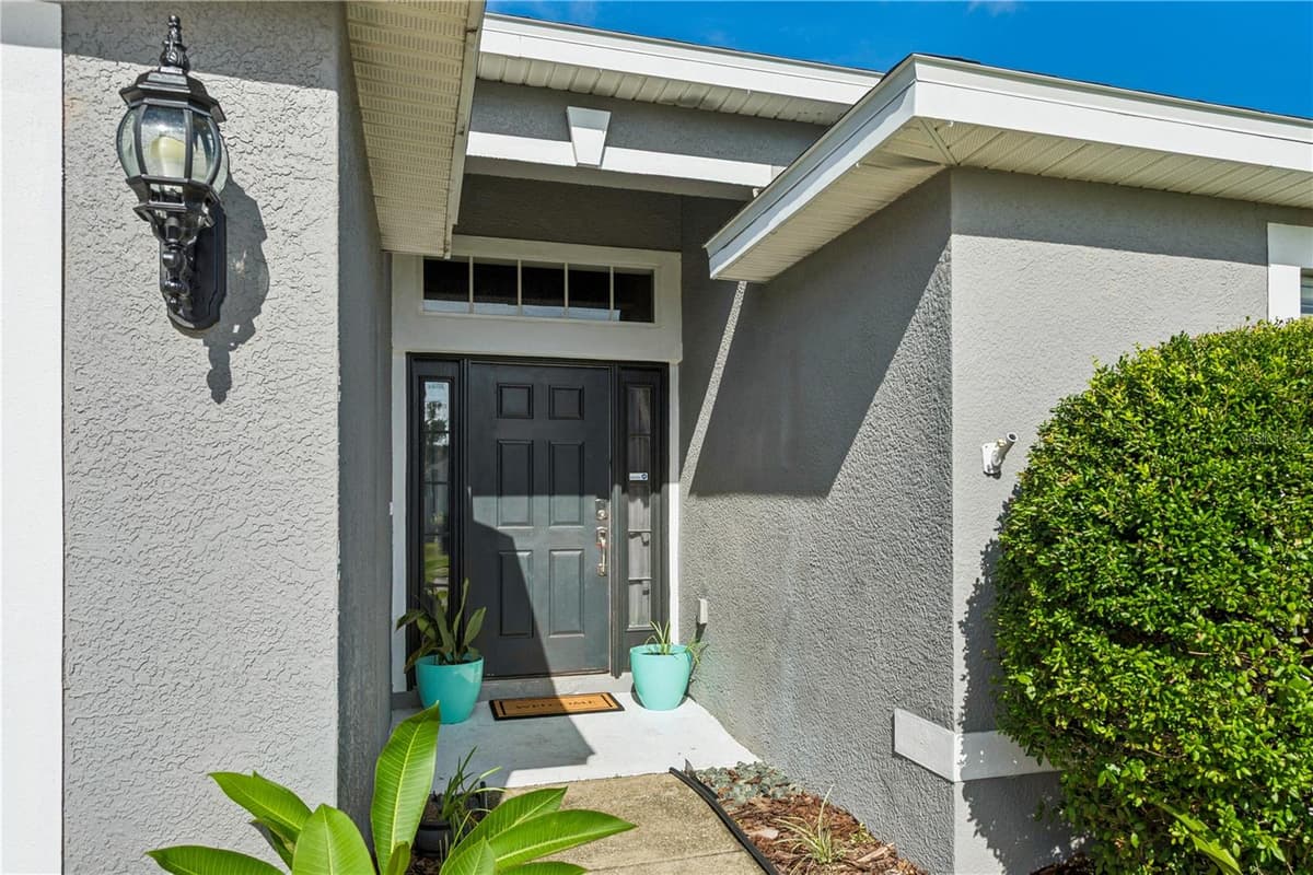 5701 SWEET WILLIAM TERRACE — photo 2 of 34