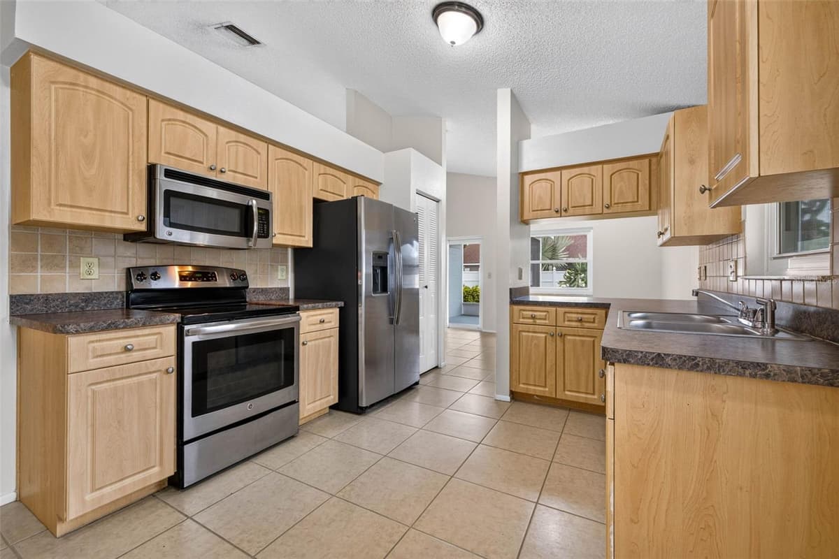 5910 BUTTON QUAIL COURT — photo 5 of 27