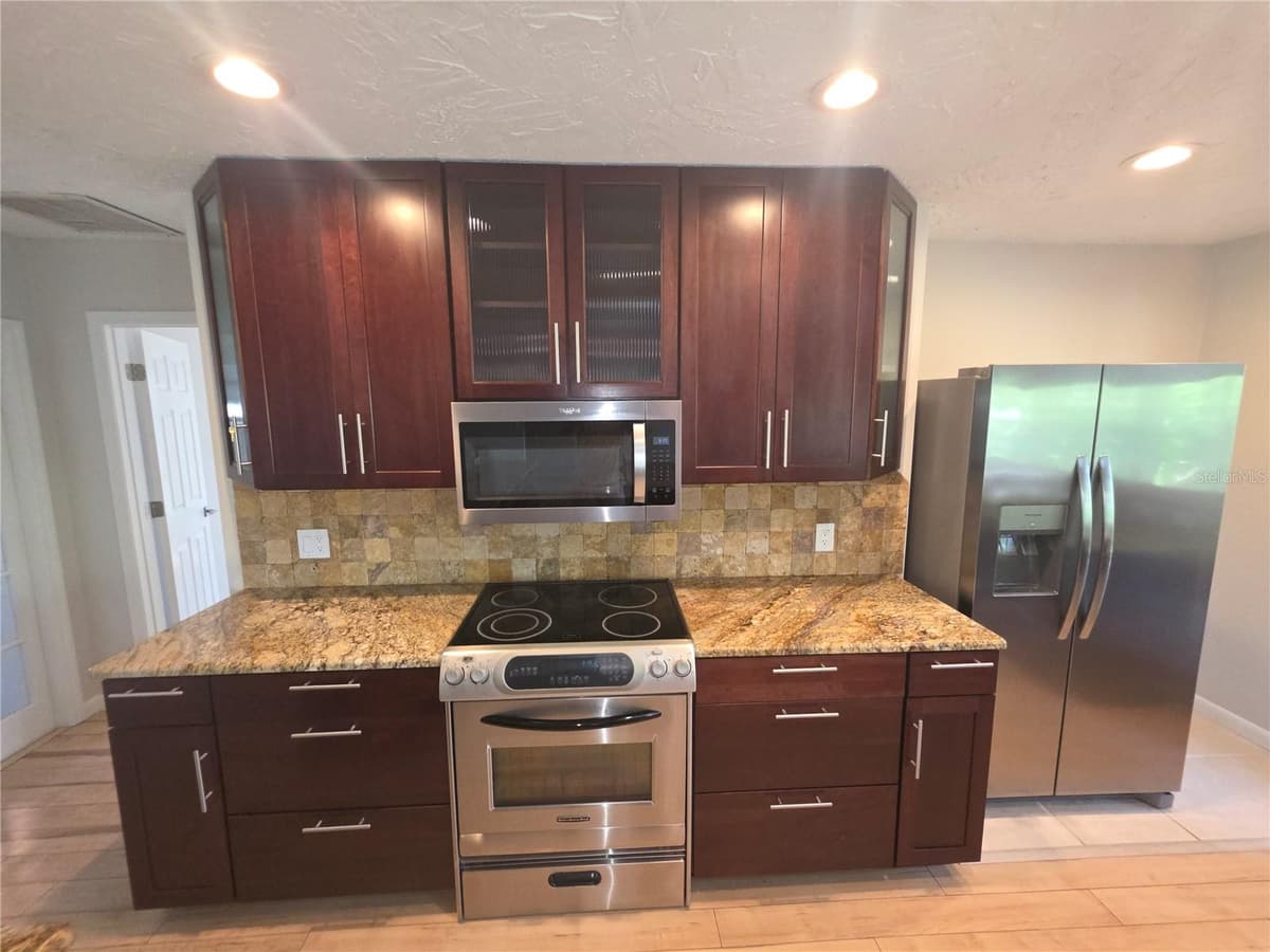 7708 9TH AVE DRIVE — photo 9 of 45