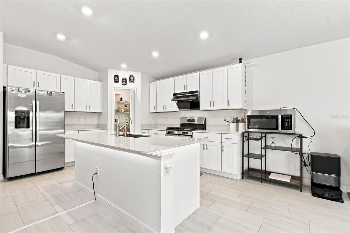 34701 RAINVILLE LOOP — photo 14 of 96