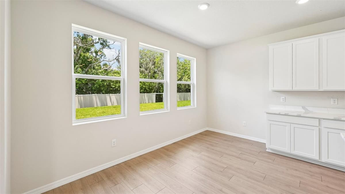 10437 WOODLAND GARDEN WAY — photo 7 of 51