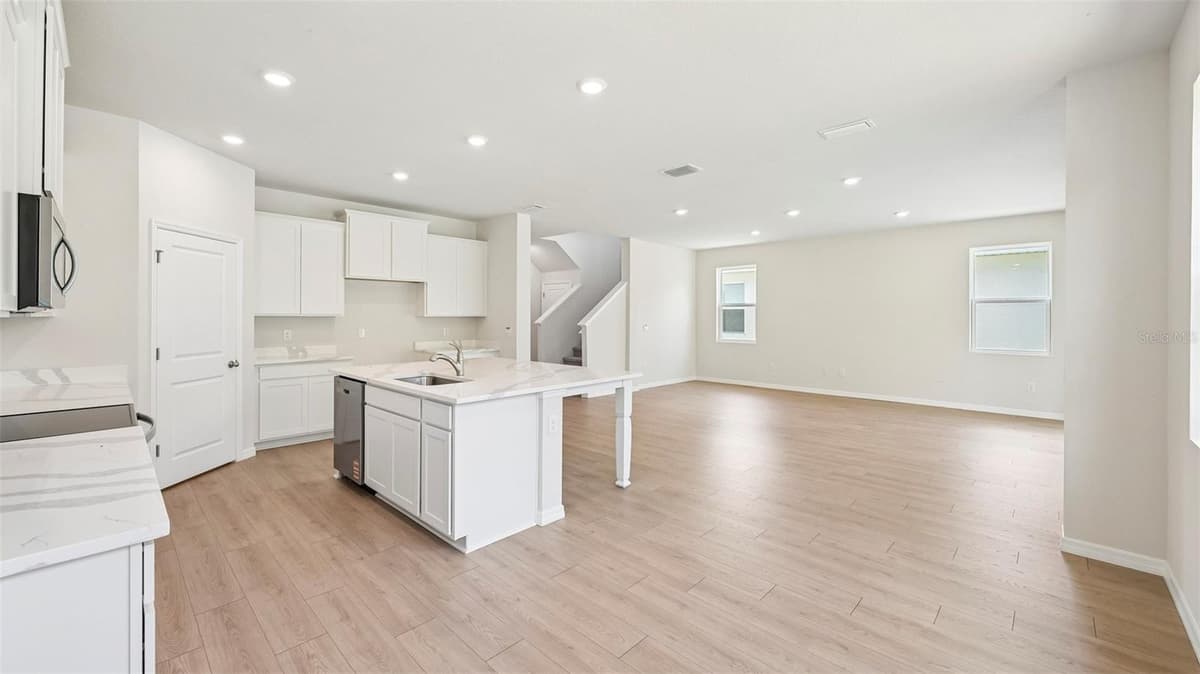10437 WOODLAND GARDEN WAY — photo 9 of 51