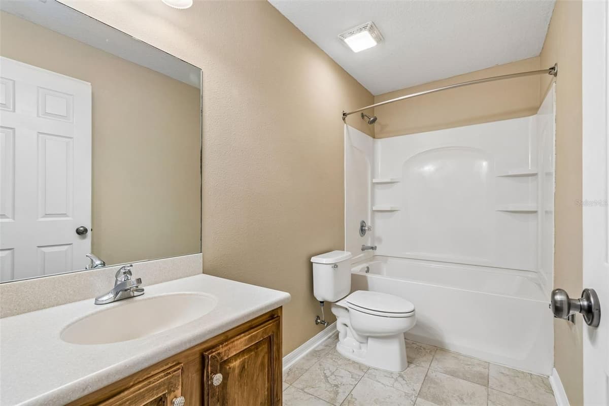10818 GREAT CARLISLE COURT — photo 17 of 25