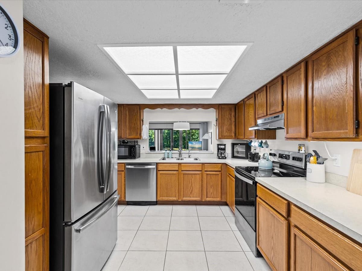 7719 COSME DRIVE — photo 12 of 54