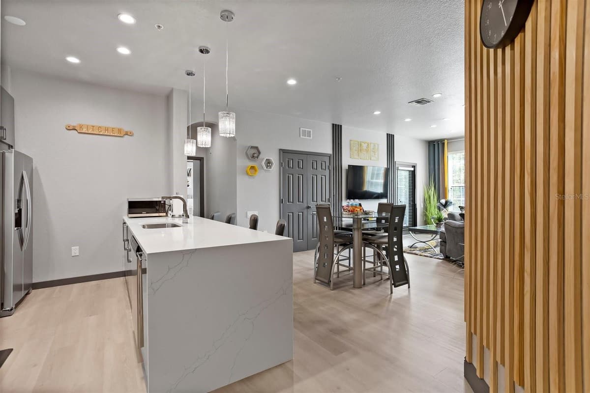 7675 COMROW ST — photo 2 of 34