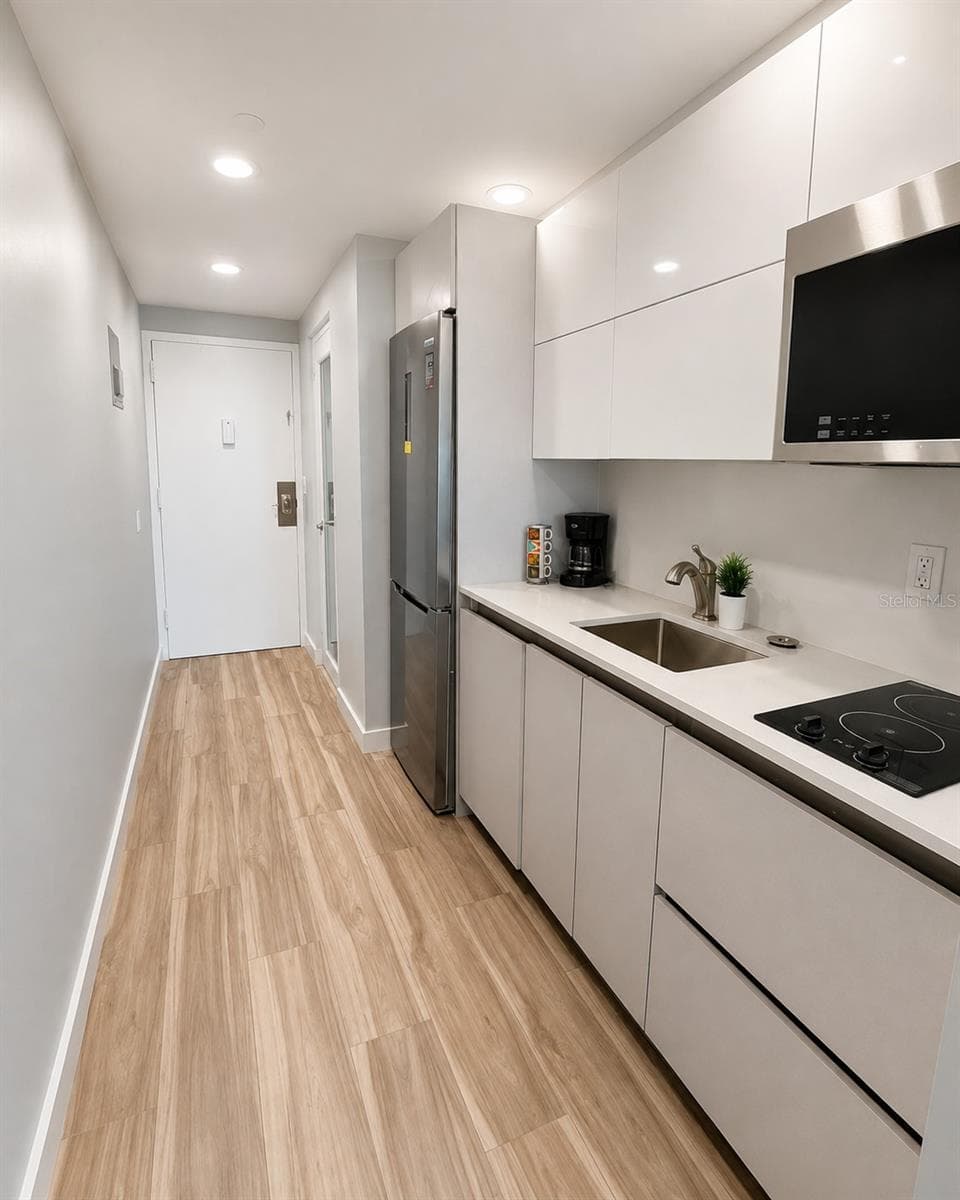 6165 AVE. ISLA VERDE — photo 2 of 13